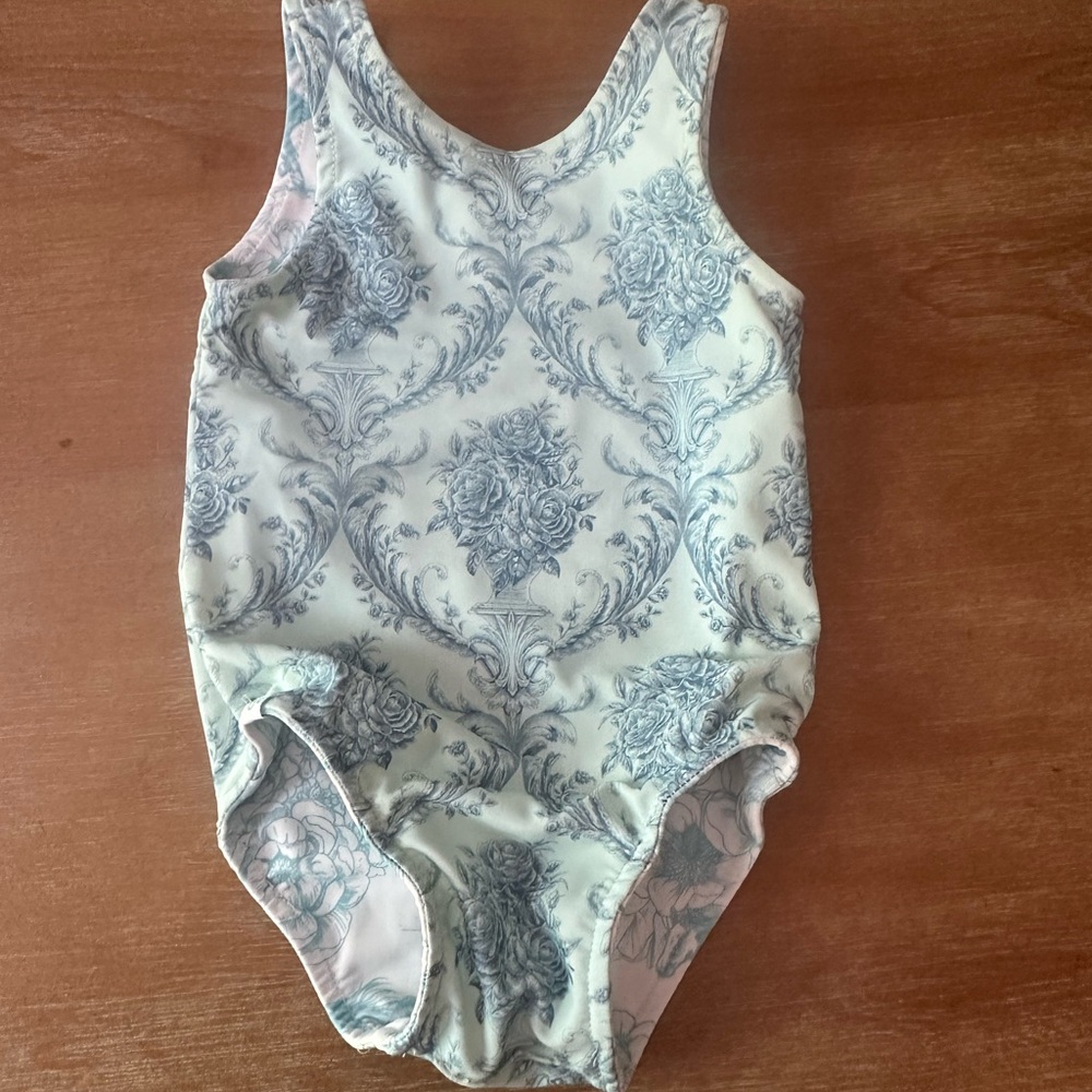 Posh Peanut Blue and Cream Floral Bodysuit